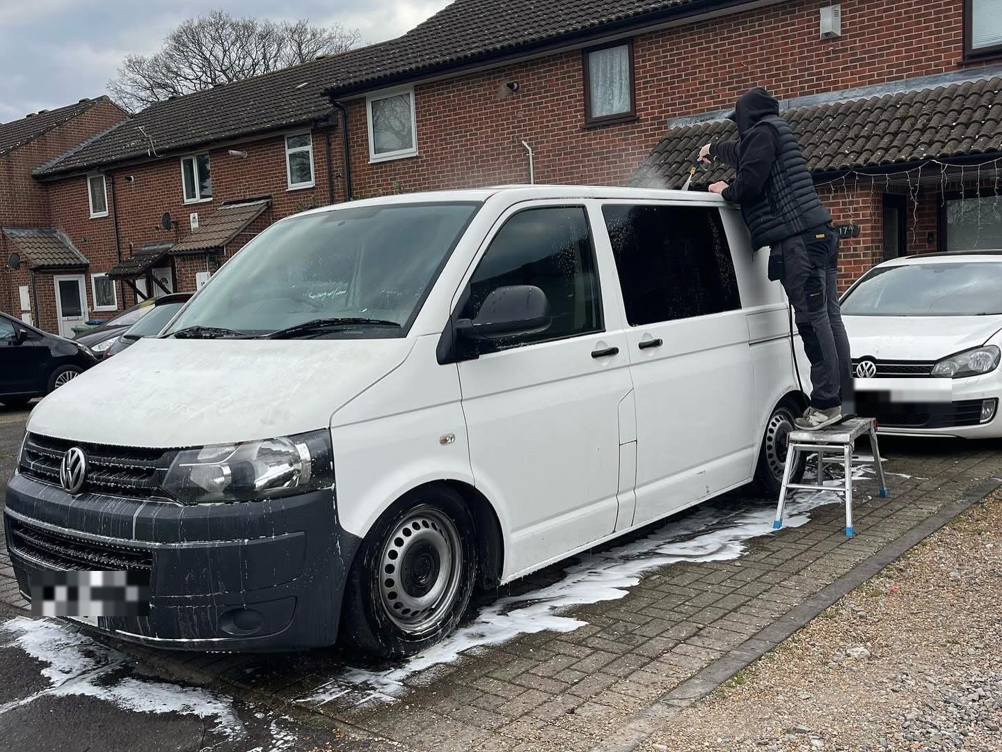 Snow foam pre-wash being applied to a VW Transporter